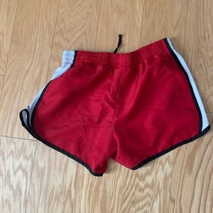 Red and white athletic shorts size S (4-6)